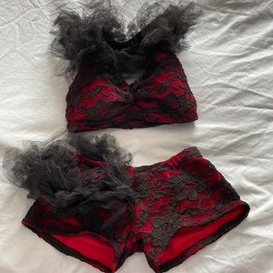 Girls XL costume. Black and red 2 piece halter neck. Like new.